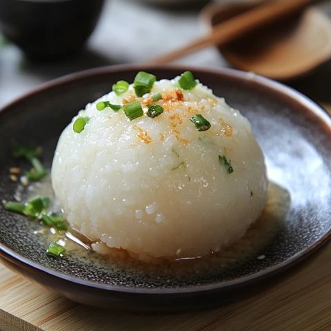 中國朝鮮族傳統(tǒng)美食:錘煉出味的糯米打糕