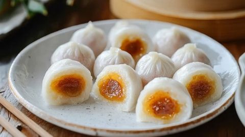 中國朝鮮族傳統(tǒng)美食:錘煉出味的糯米打糕